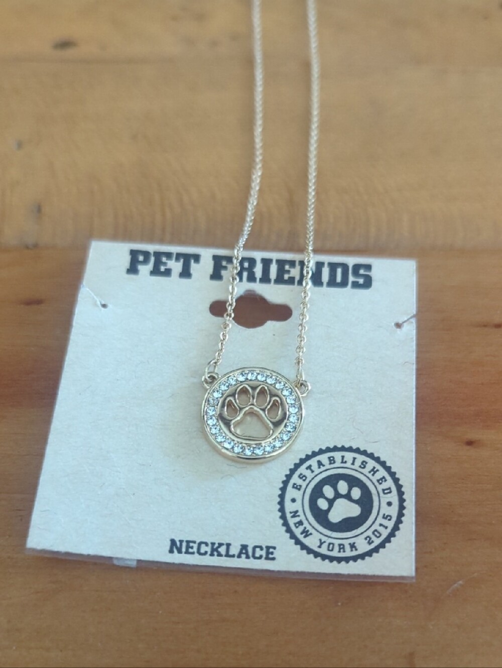 FRIENDS Gold Paw Print Pendant Necklace